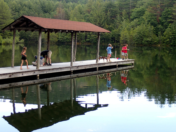 Fishing off pier in Dupont Forest. 